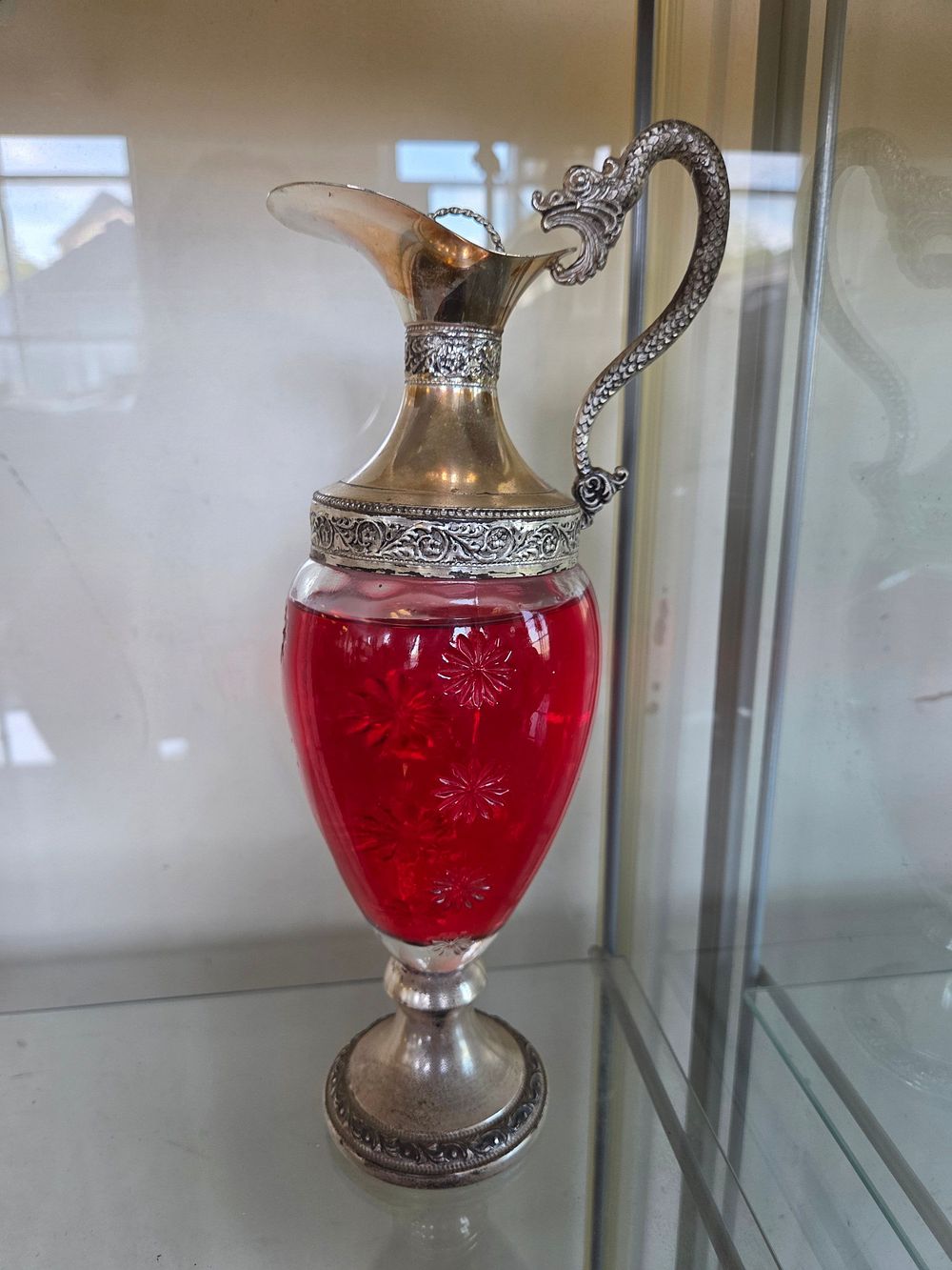 Lot 631 – Victorian Style Ruby Glass Claret Jug with Serpent Handle