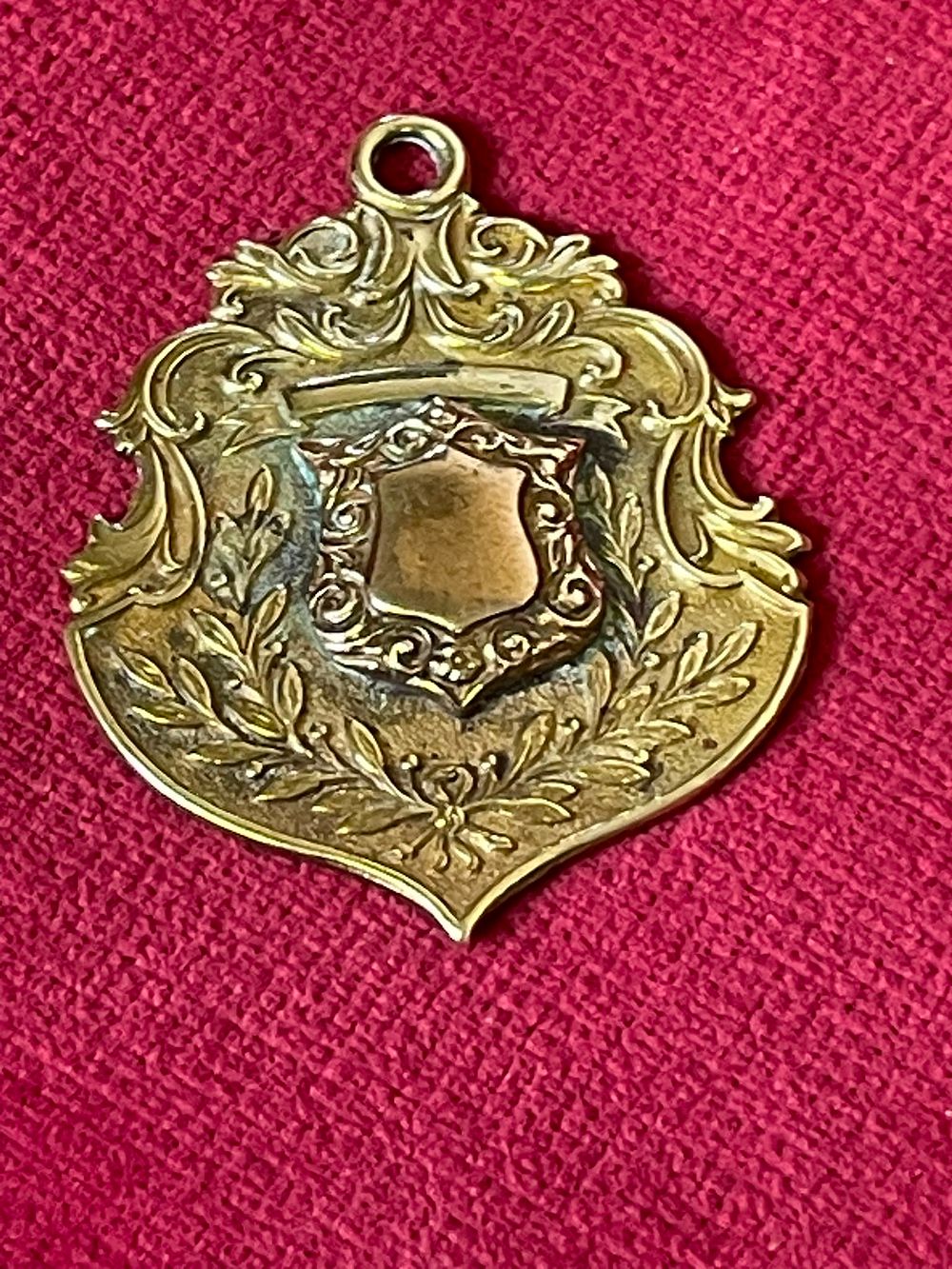 Lot 643 – Antique 18 Carat Gold Plated Shield Watch Fob 8.76g