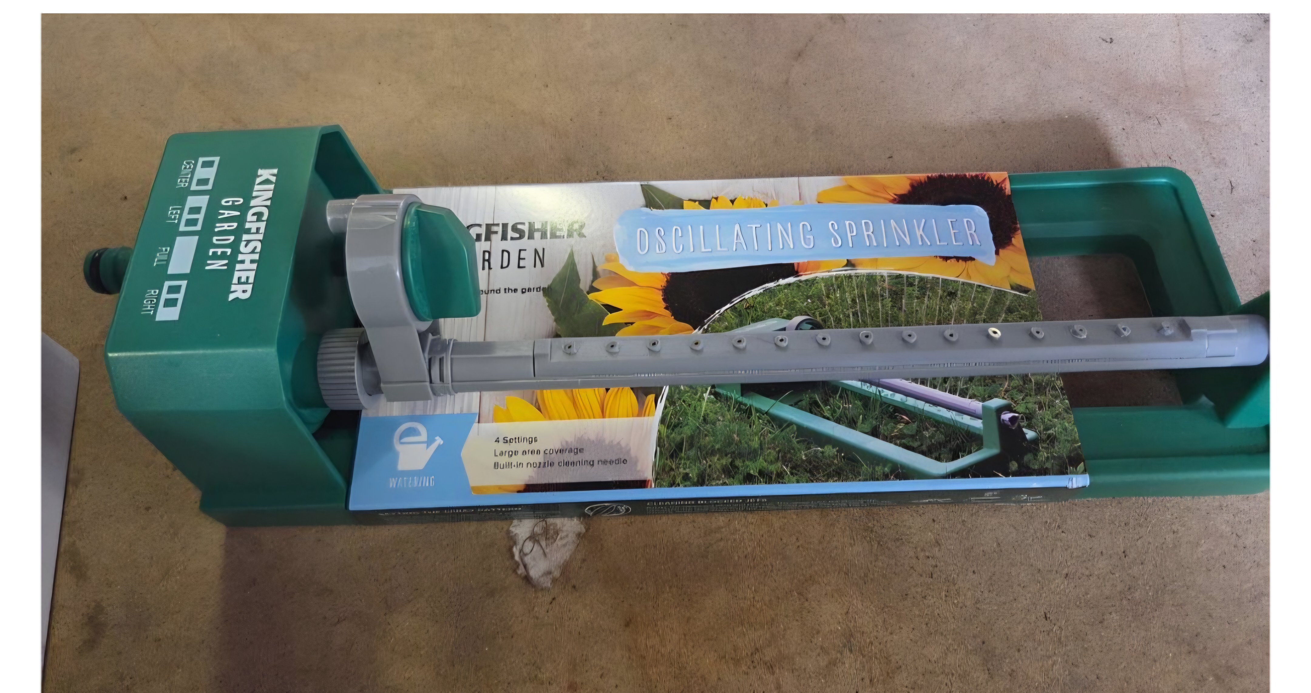 A Kingfisher Garden oscillating lawn sprinkler