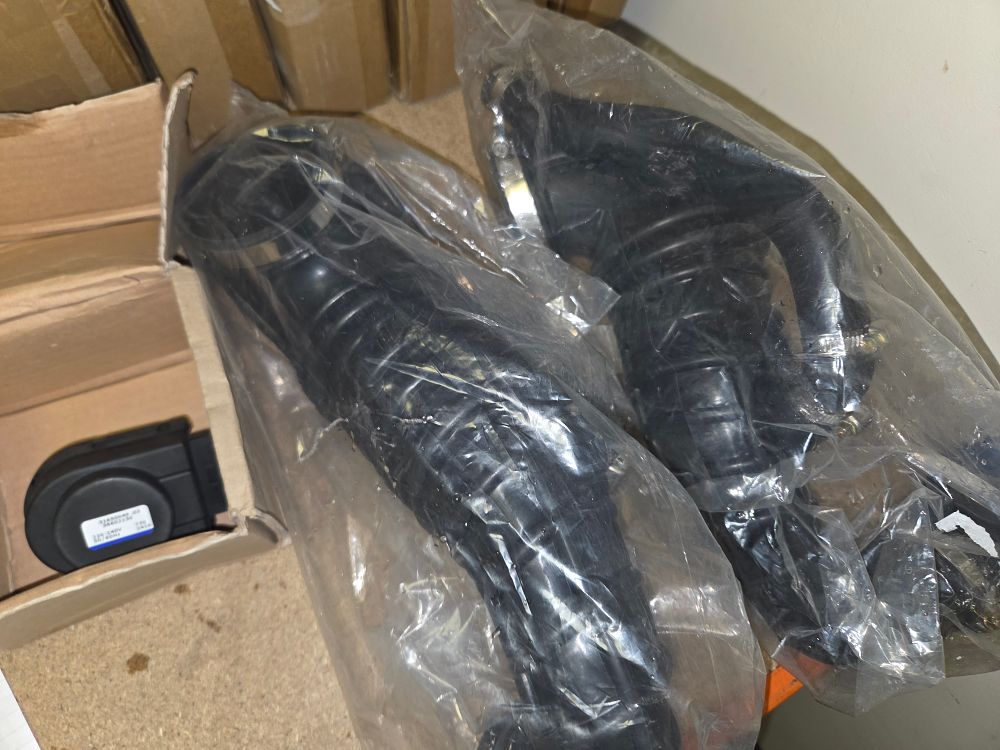 Lot 161 – Three Domestic Appliance Spare Parts Including Drain Pump Motor and Bellows Hoses
