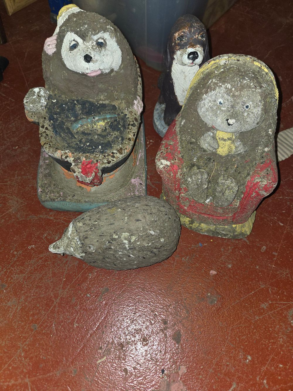 Lot 182 – A Selection of Weathered Stone Garden Ornaments Including Tanuki-Style Figures and a Hedgehog