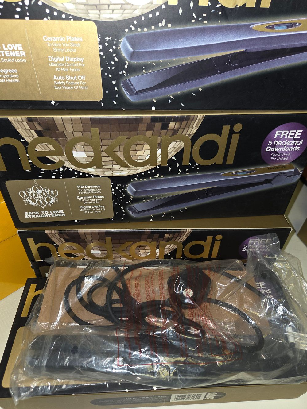 Lot 219 – Four Hedkandi Back to Love Digital Hair Straighteners