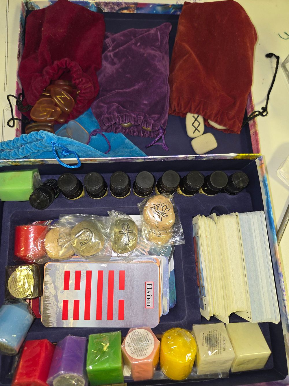 Lot 259 – One Box of Miscellaneous Spiritual and Divination Collectables Including Tarot Cards and Rune Stones