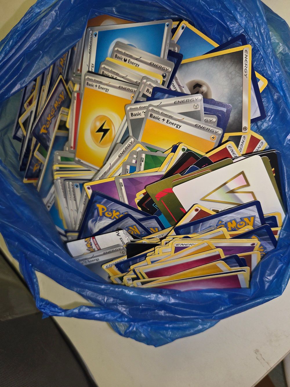 Lot 270 – One Bag of Pokémon Trading Cards Including Basic Energy and Pokémon V