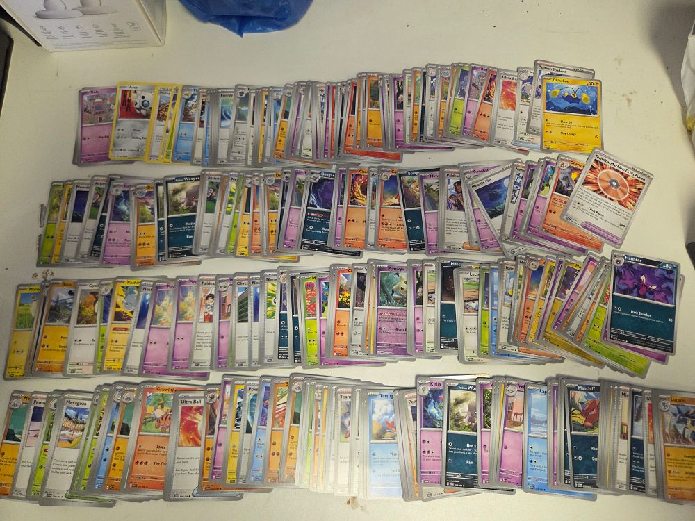 Lot 273 – A Collection of Pokémon Trading Cards Including Lucario Gengar and Mimikyu