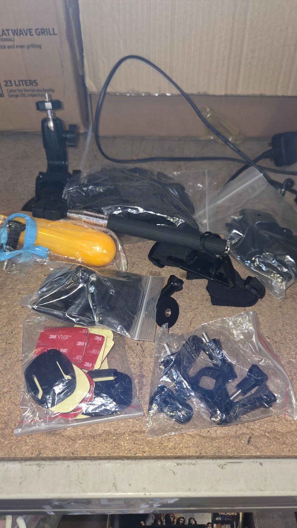 Lot 287 – An Assortment of Action Camera Accessories including Monopod and Floating Grip