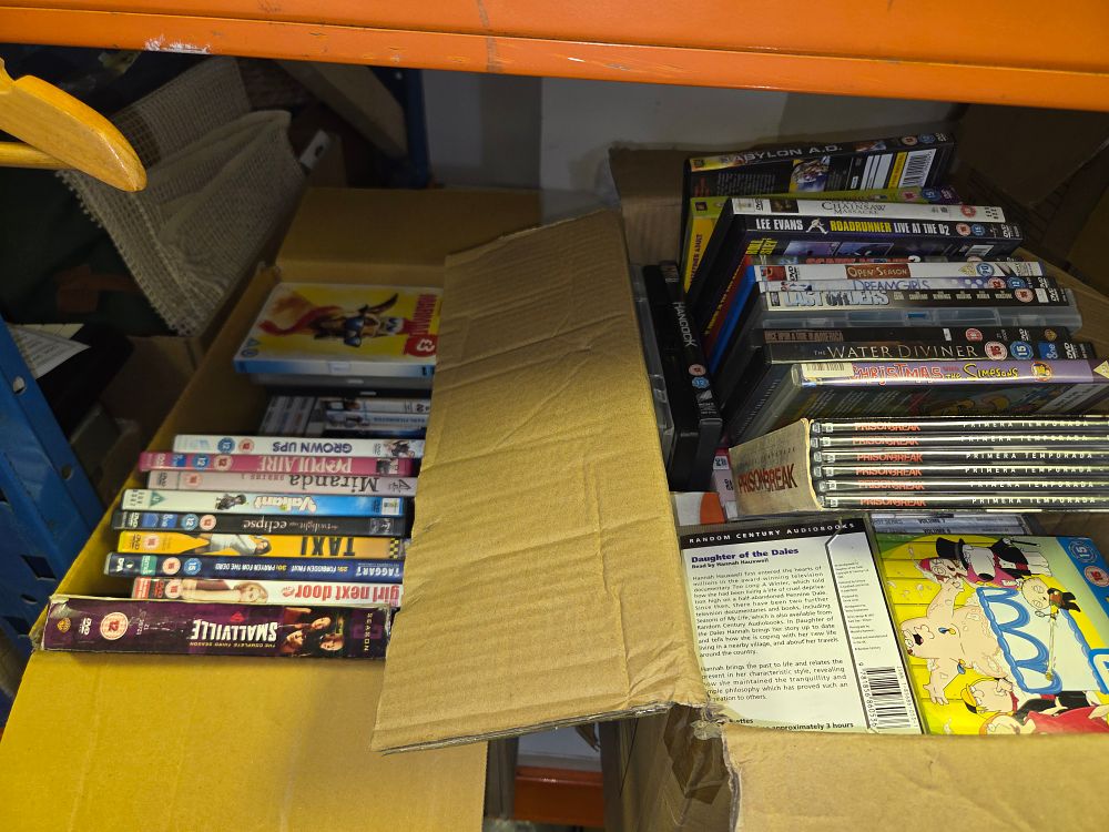 Lot 354 – Two Boxes of DVDs and Television Box Sets Including Smallville and The Simpsons