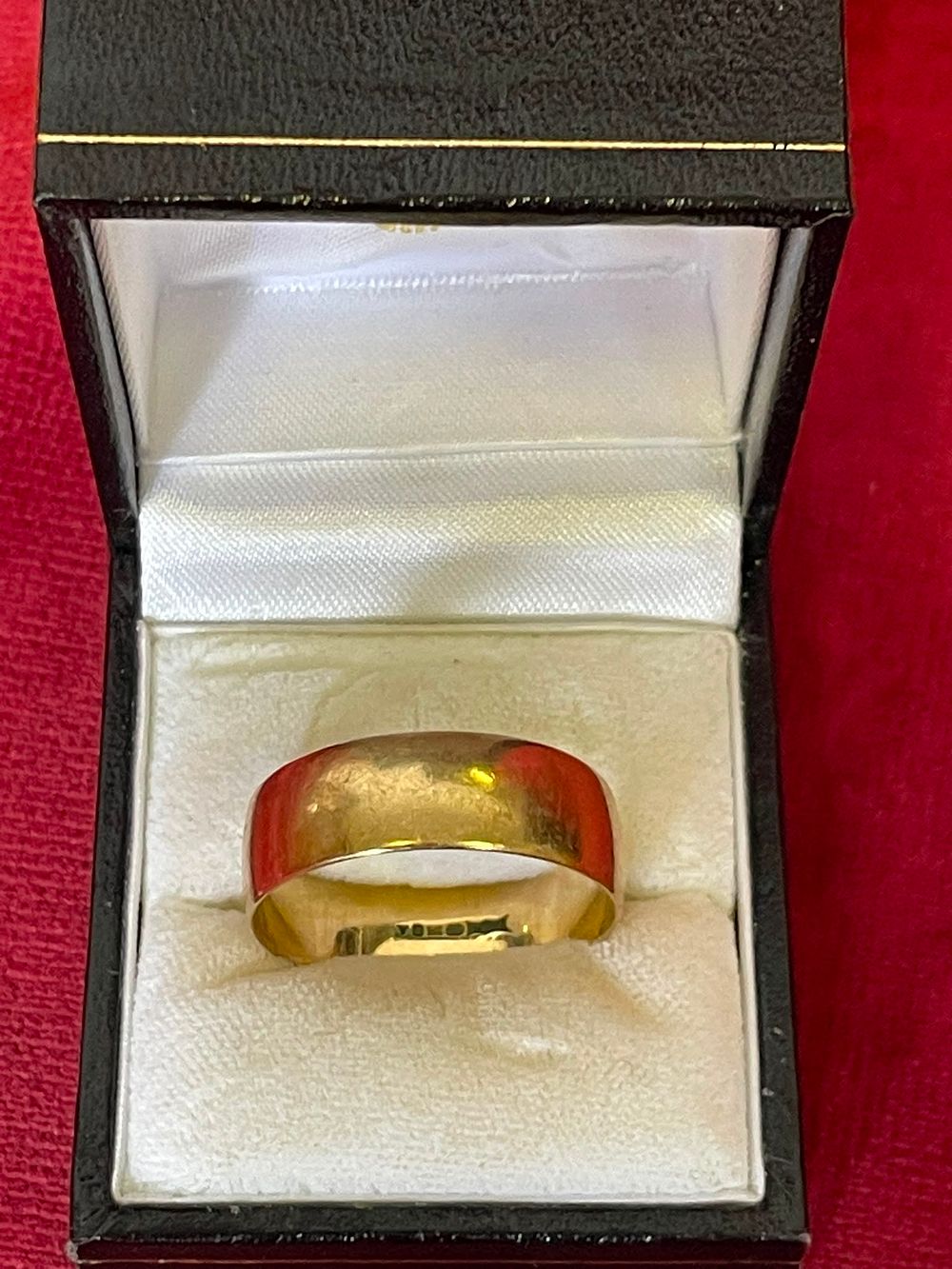 Lot 631 – A 9 Carat Yellow Gold Wide Wedding Band by V. G. and Sons 5.29g