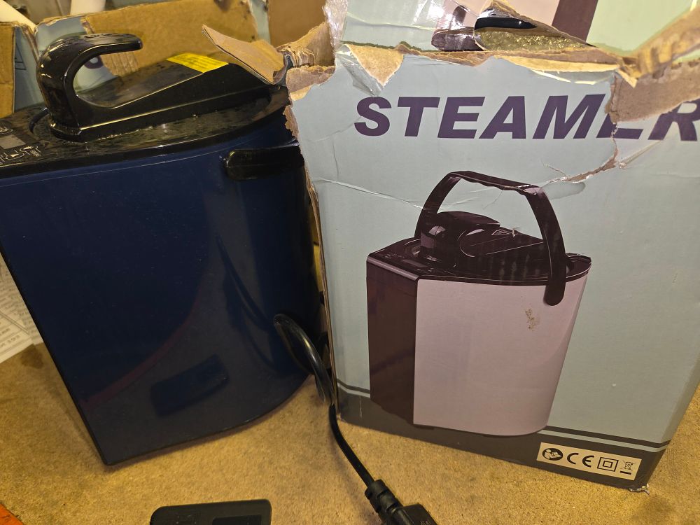 Lot 313 – Two Portable Sauna Steamers