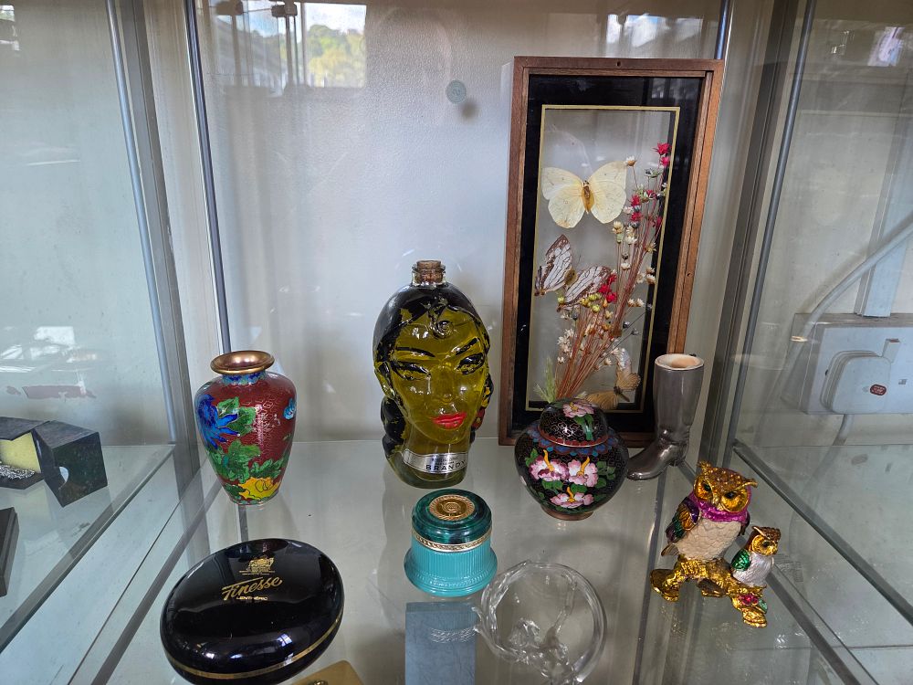 Lot 634 – A Selection of Decorative Collectables Including Bodegas Comas Brandy Bottle and Lentheric Finesse Compact