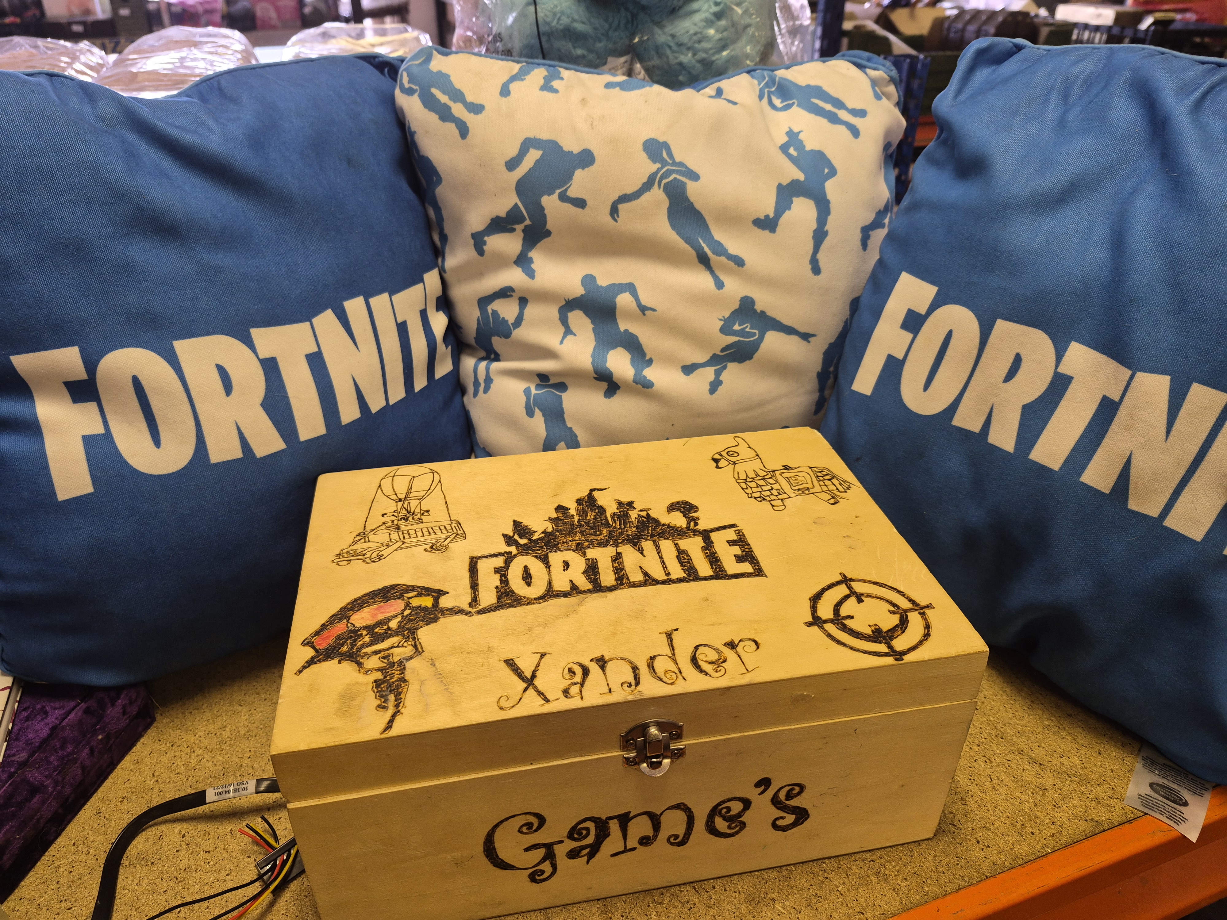 A Selection of Fortnite Collectables and a Customized Wooden Games Chest Including Hit Send Board Games