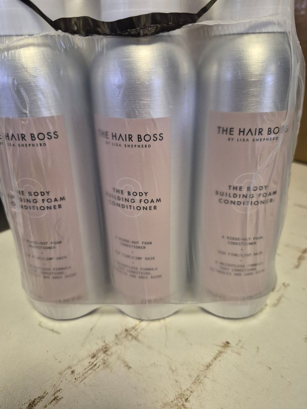 Lot 255 – Six Tins of The Hair Boss Body Building Foam Conditioners