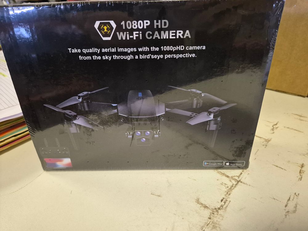 Lot 257 – Foldable 1080P HD Wi-Fi Camera Drone sealed box