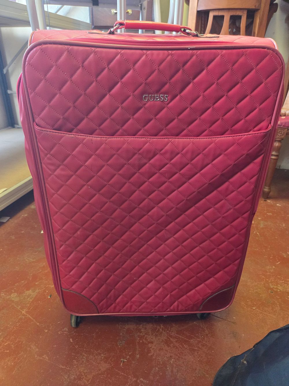 Lot 239 – Large Guess Quilted Soft-Sided Upright Suitcase