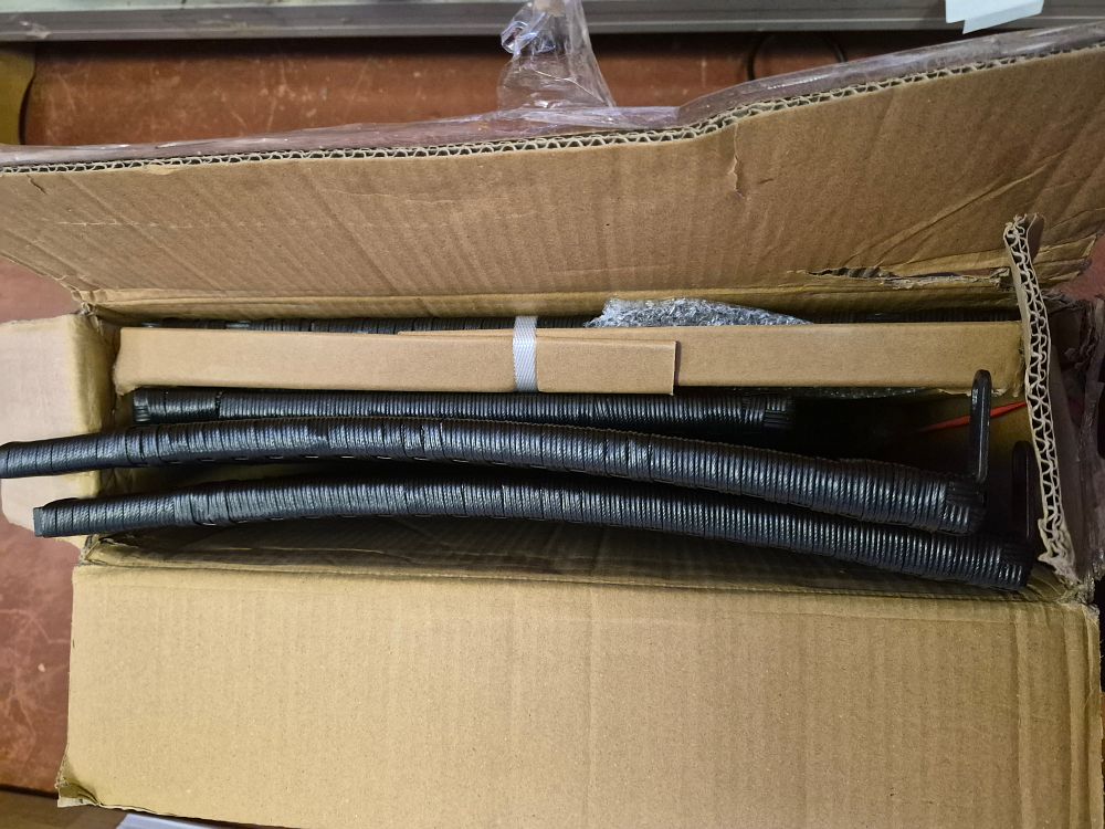 Lot 212 – New Boxed Rattan Garden Table
