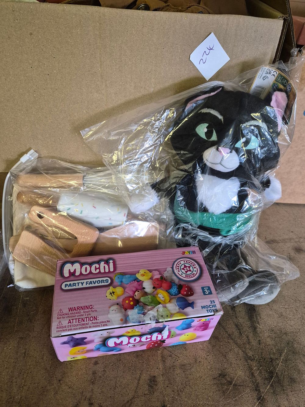 Lot 229 – A Selection of New Toys Including Dreamworks Puss in Boots Plush and Joyin Mochi Party Favors