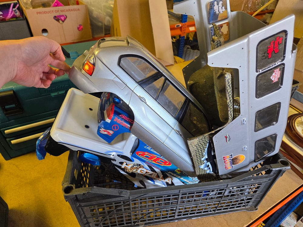 Lot 298 – Crate of Radio Controlled Vehicle Body Shells and Chassis Parts Including Pro-Line