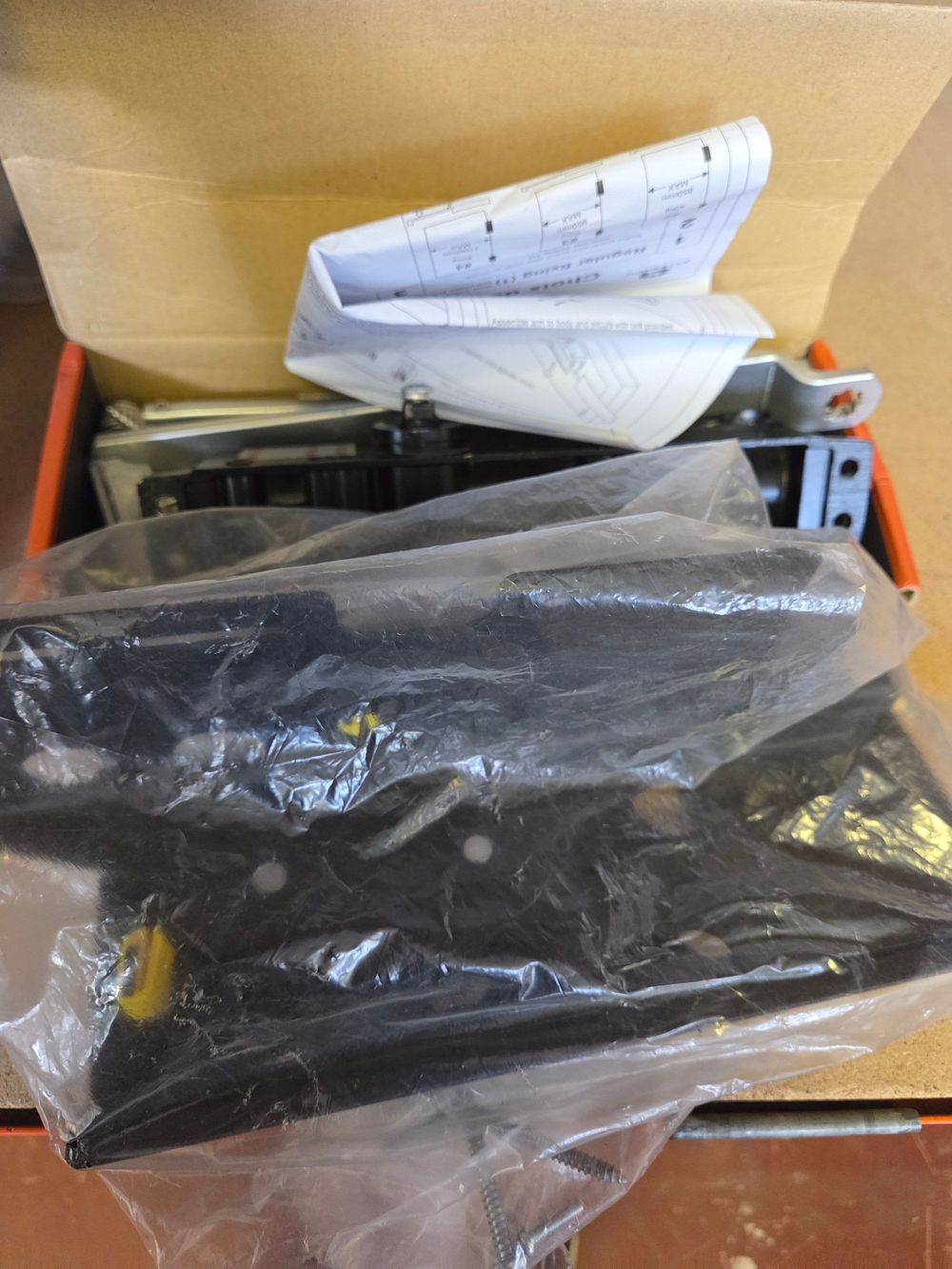 Lot 317 – One Briton 1110 Series Overhead Door Closer and a TV wall bracket