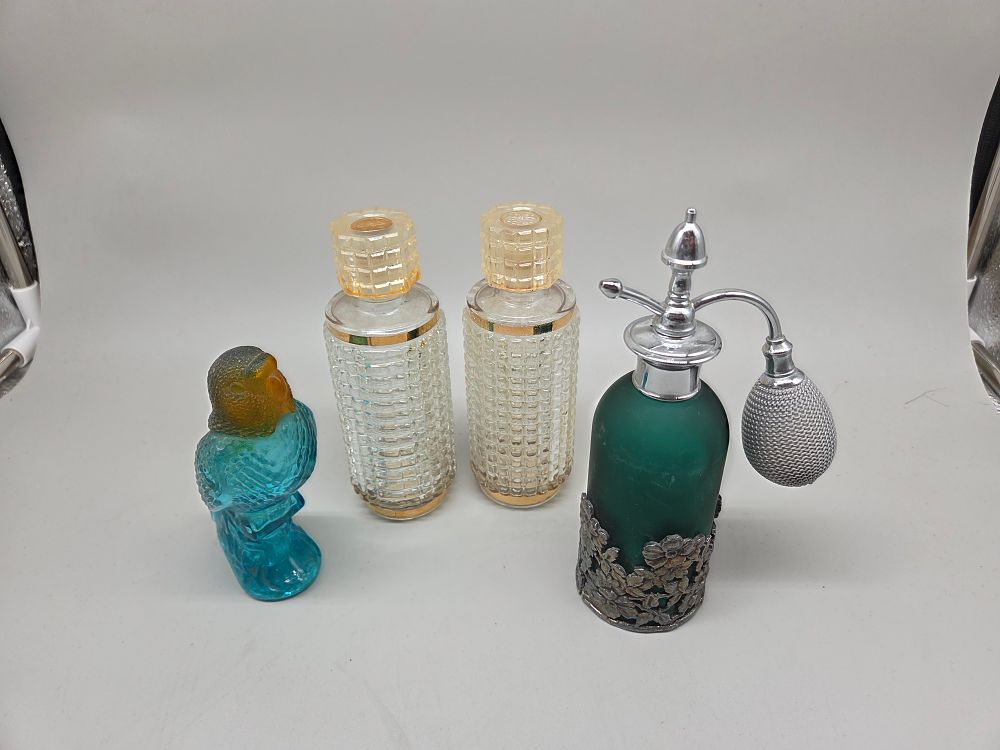 Lot 151 – A Selection of Decorative Glass Perfume and Scent Bottles