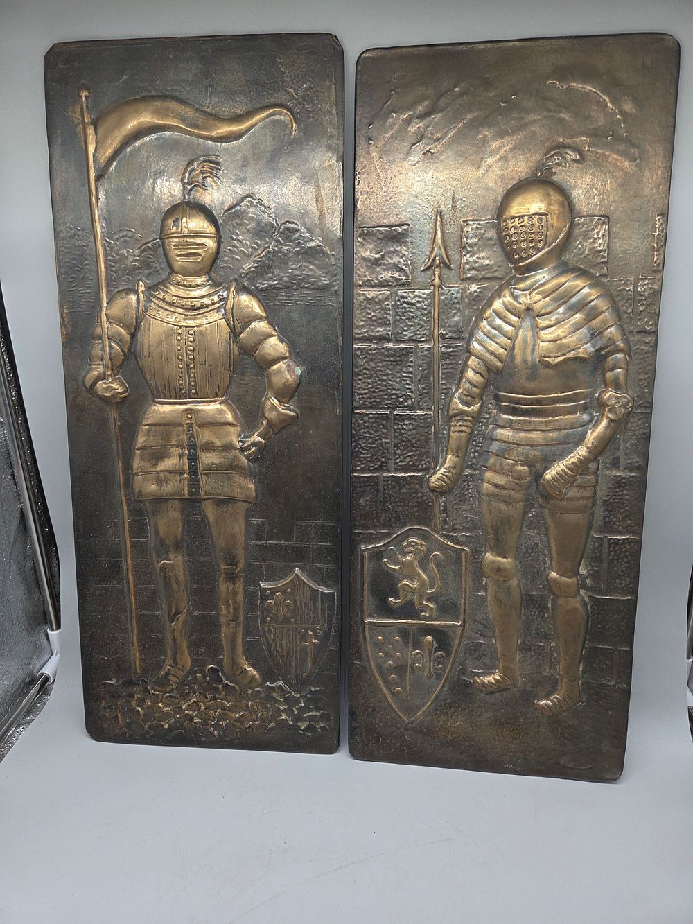 Lot 170 – A Pair of Embossed Brass Decorative Medieval Knight Wall Plaques