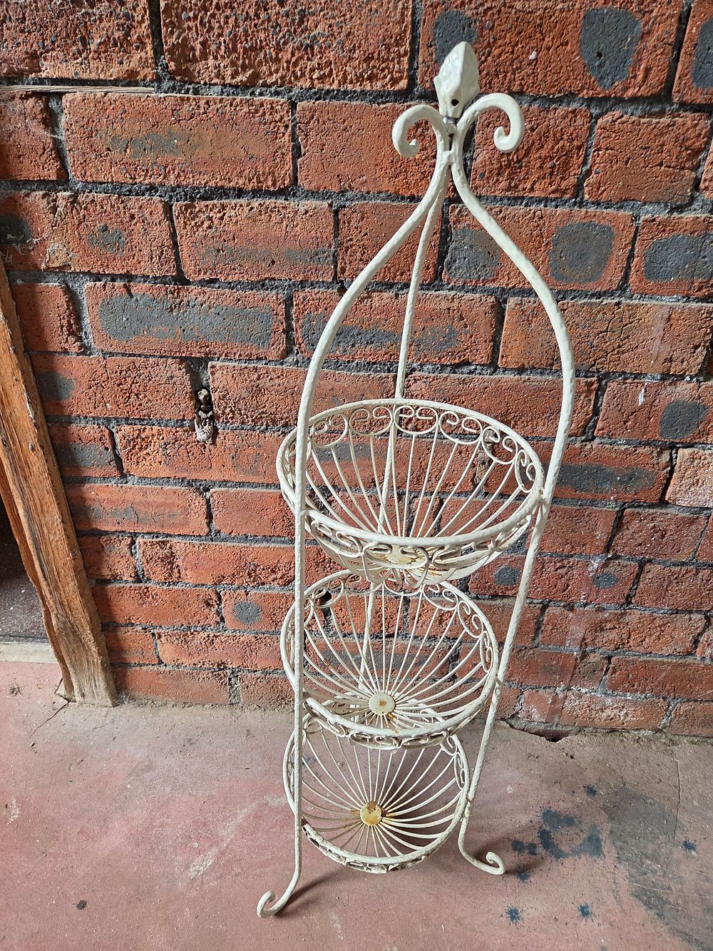 Lot 182 – Wrought Metal Three-Tier Wall-Mounted Plant Stand