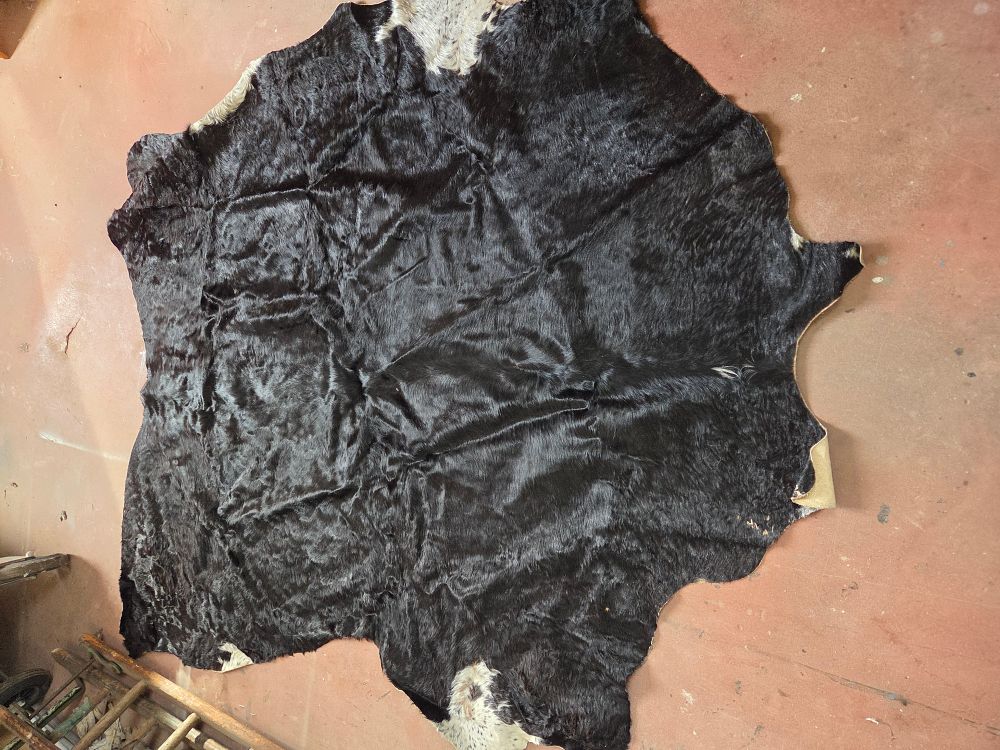 Lot 188 – Natural Black and White Cowhide Rug