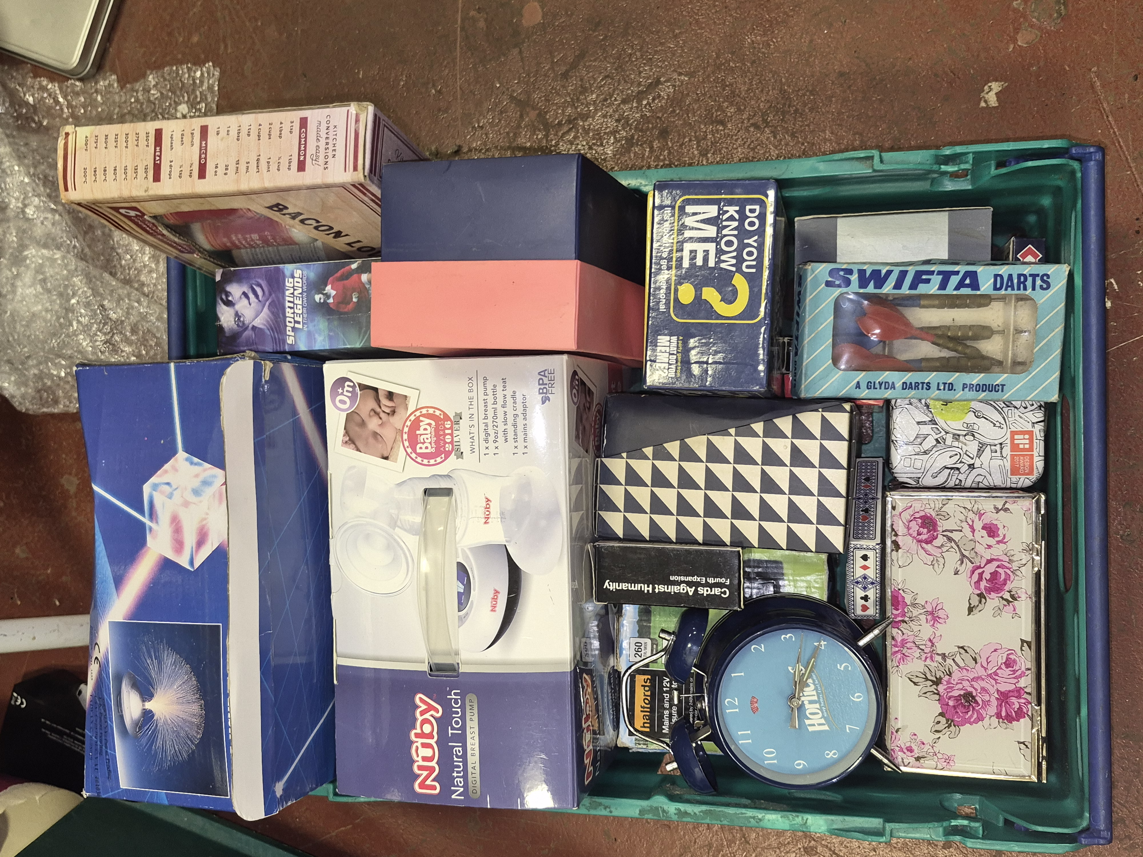 Crate of Household Goods and Toys Including Nuby Horlink and Swifta Darts