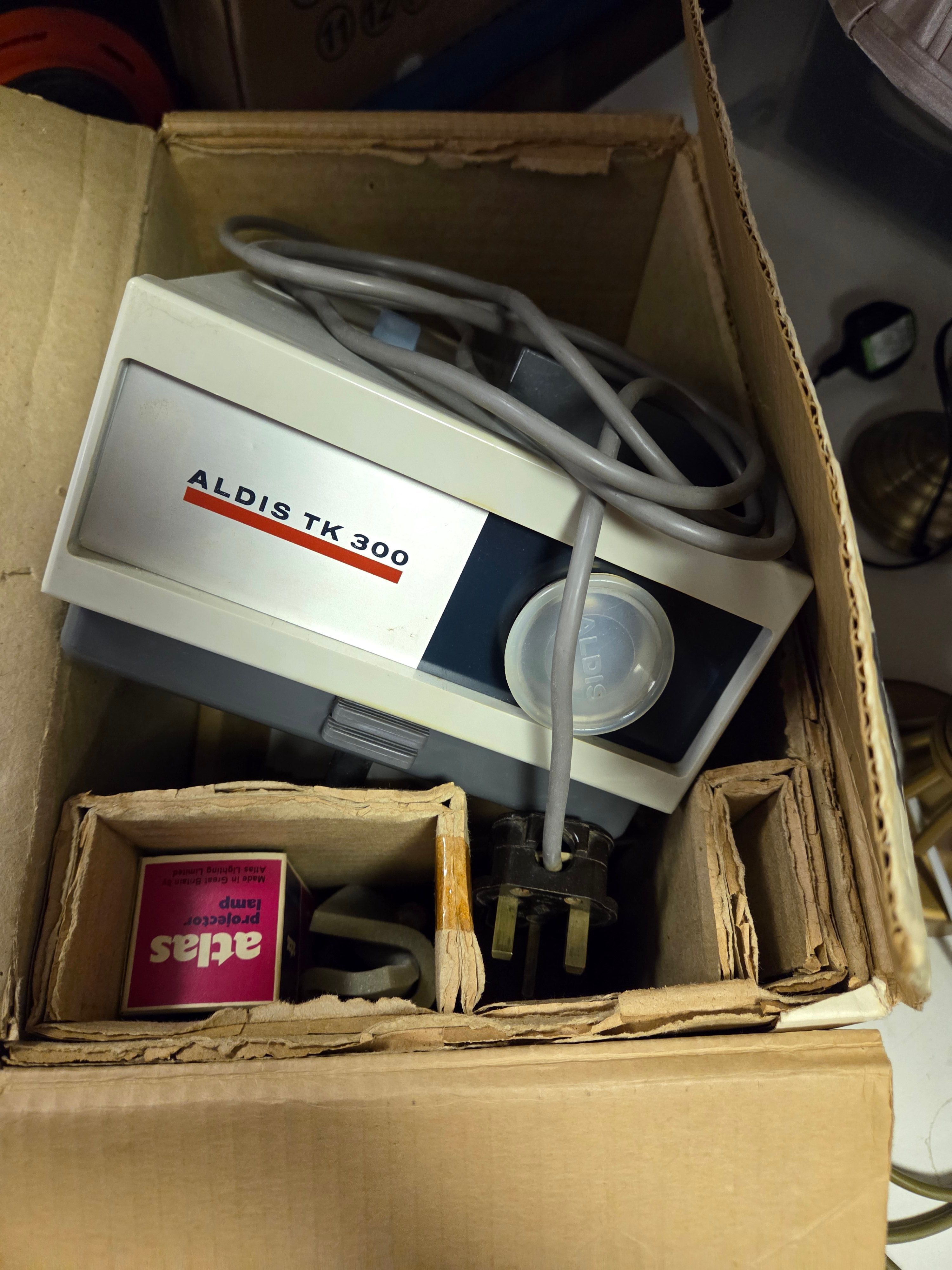 One Aldis TK 300 Single Slide Projector untested