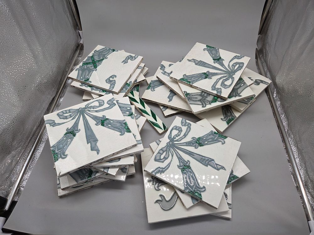 Lot 196 – A Collection of Art Nouveau Glazed Earthenware Tiles from Rawson Street market Bradford