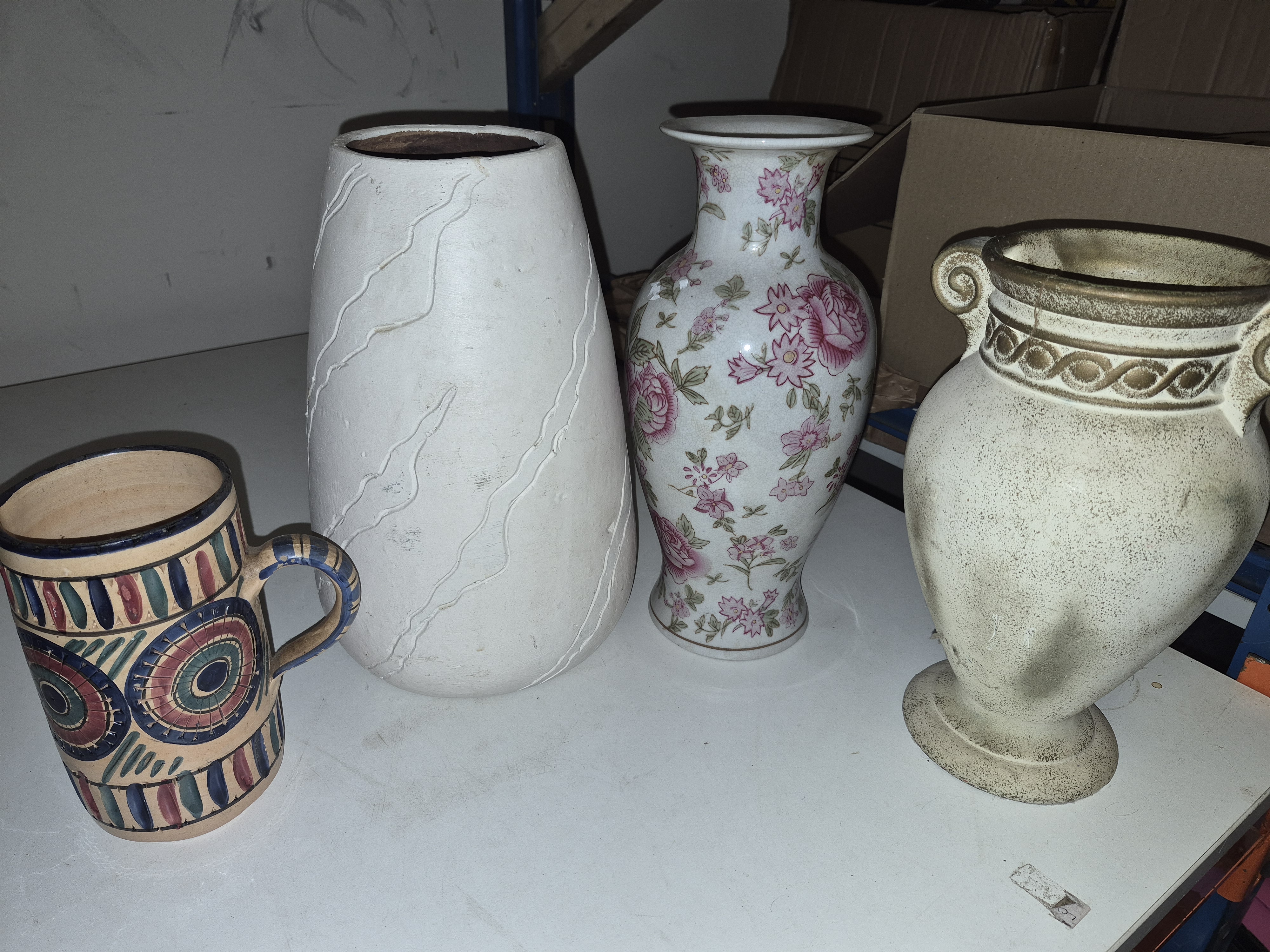 An Assortment of Decorative Earthenware and Porcelain Vases