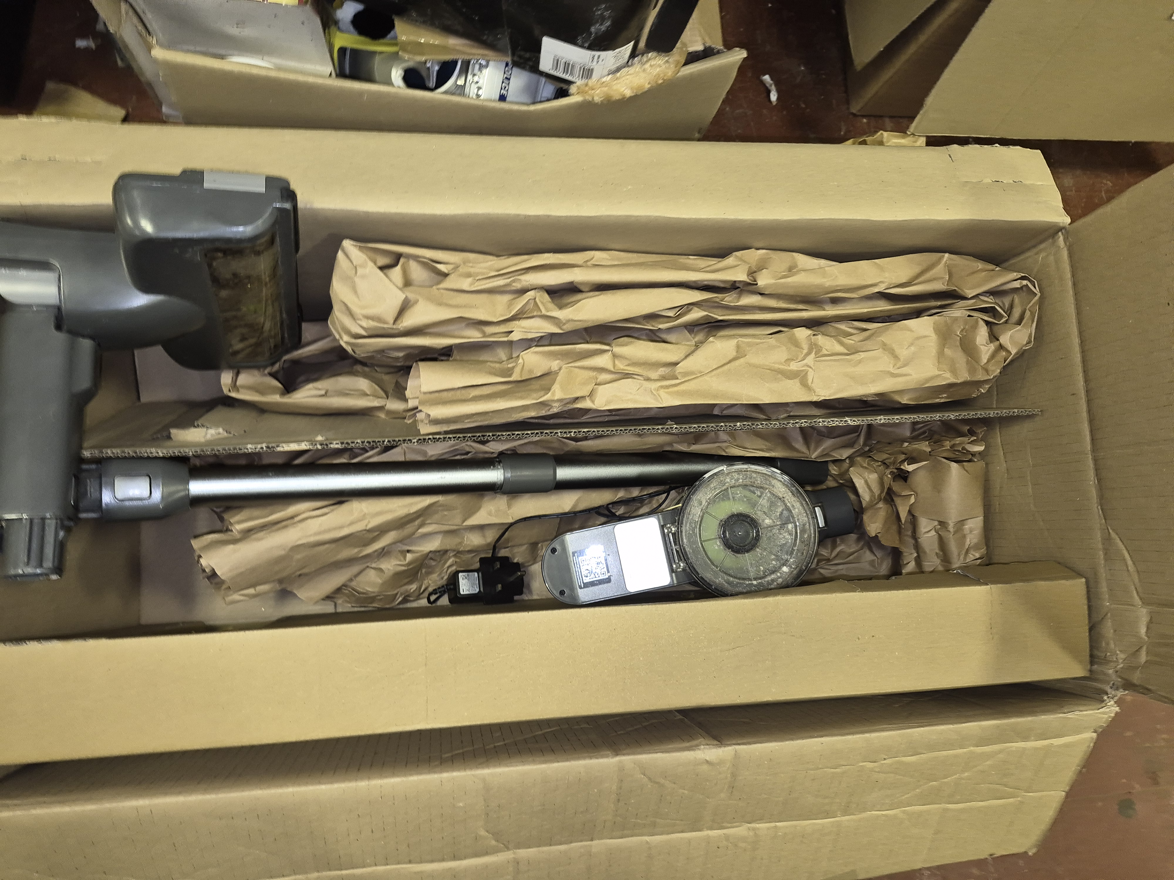 Cordless Stick Vacuum Cleaner and Accessories powers on