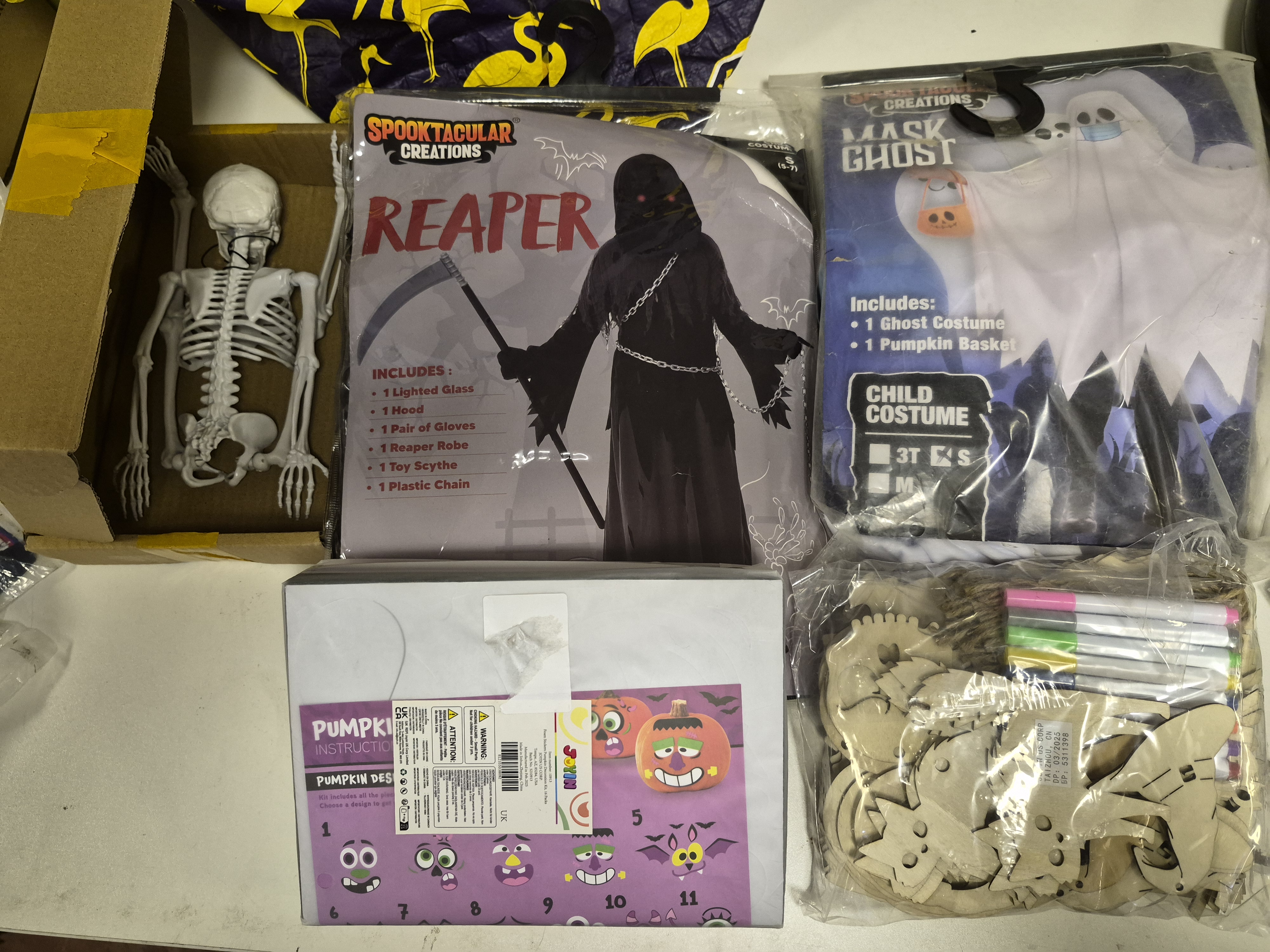 A Selection of Halloween Costumes and Craft Kits Including Spooktacular Creations and Joyin