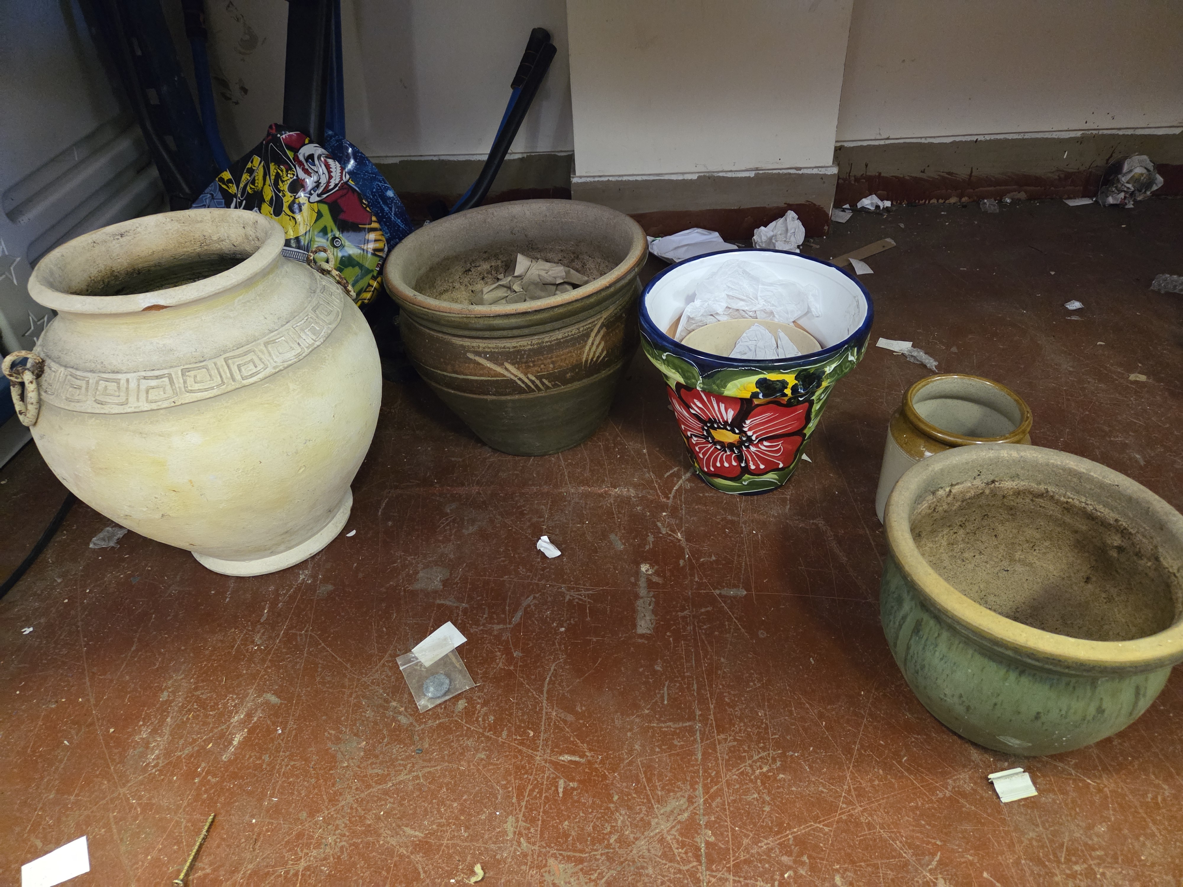 A Collection of Ceramic Garden and Decorative Pots Including Talavera-Style Planter