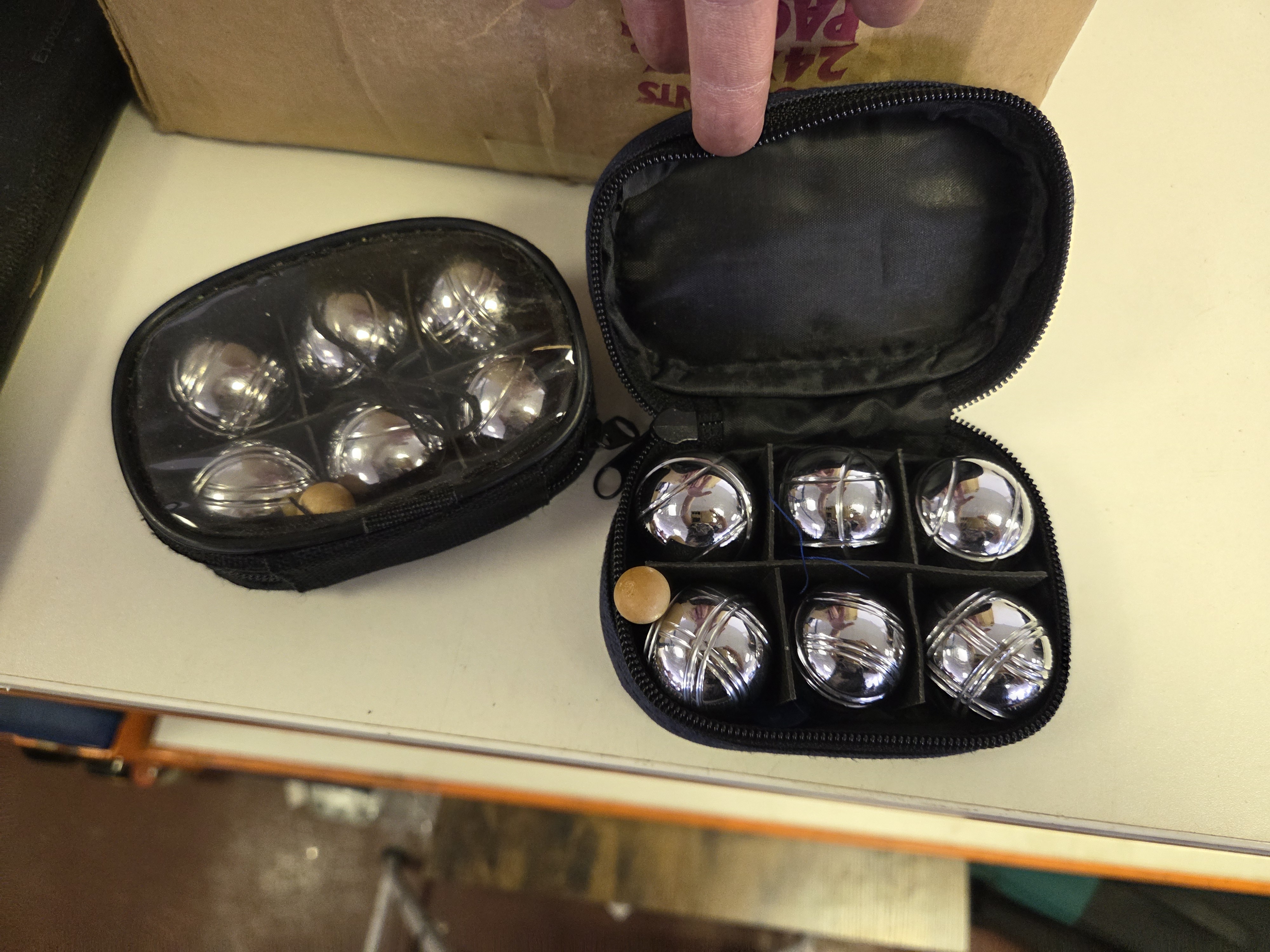 A Pair of Travel Petanque Sets