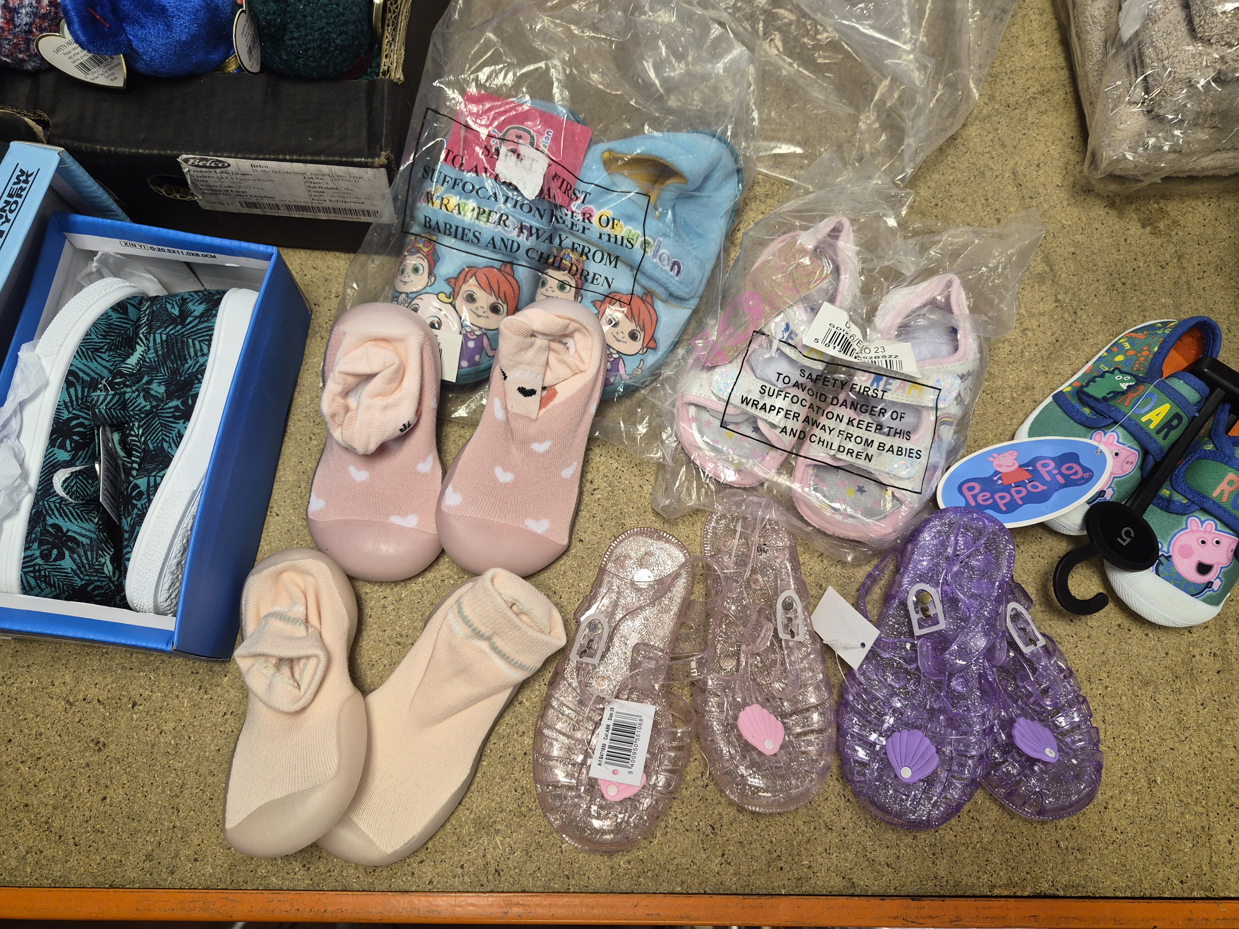 A Collection of Children's Footwear Including Peppa Pig and D'T New York canvas shoes
