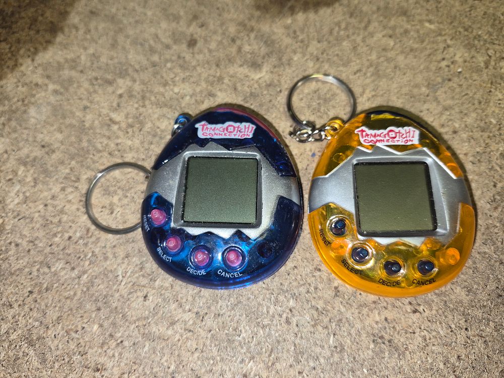 Lot 165 – Two Tamagotchi Connection Electronic Virtual Pets