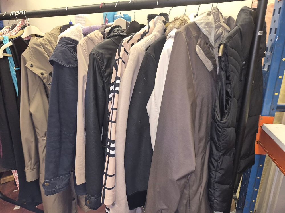 Lot 204 – An Assortment of Ladies Outerwear Including Puffer Jackets and Trench Coats