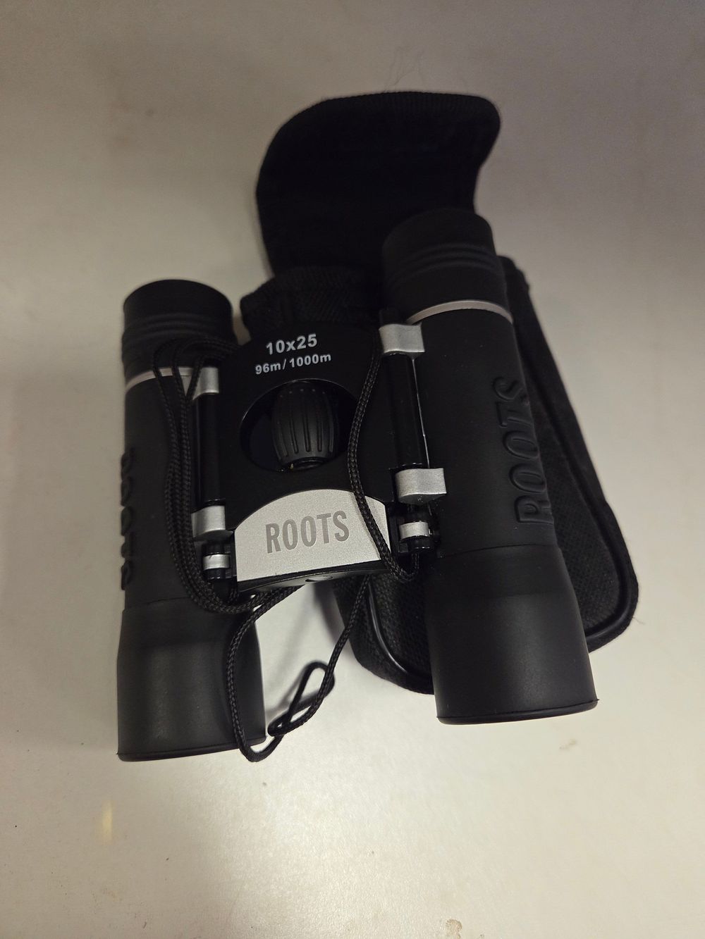 Lot 233 – One Pair of Roots 10×25 Compact Binoculars with case