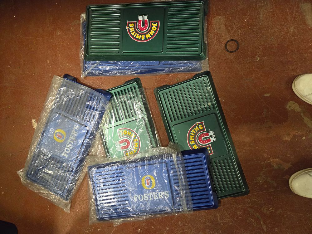 Lot 251 – Five John Smith’s and Foster’s Plastic Drip Trays new old stock