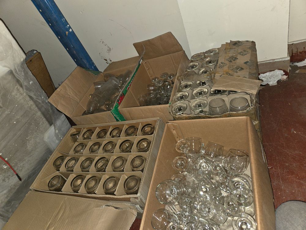 Lot 290 – Five Boxes of Clear and Smoke Tinted Glassware Including Wine Glasses, Goblets, and Tumblers