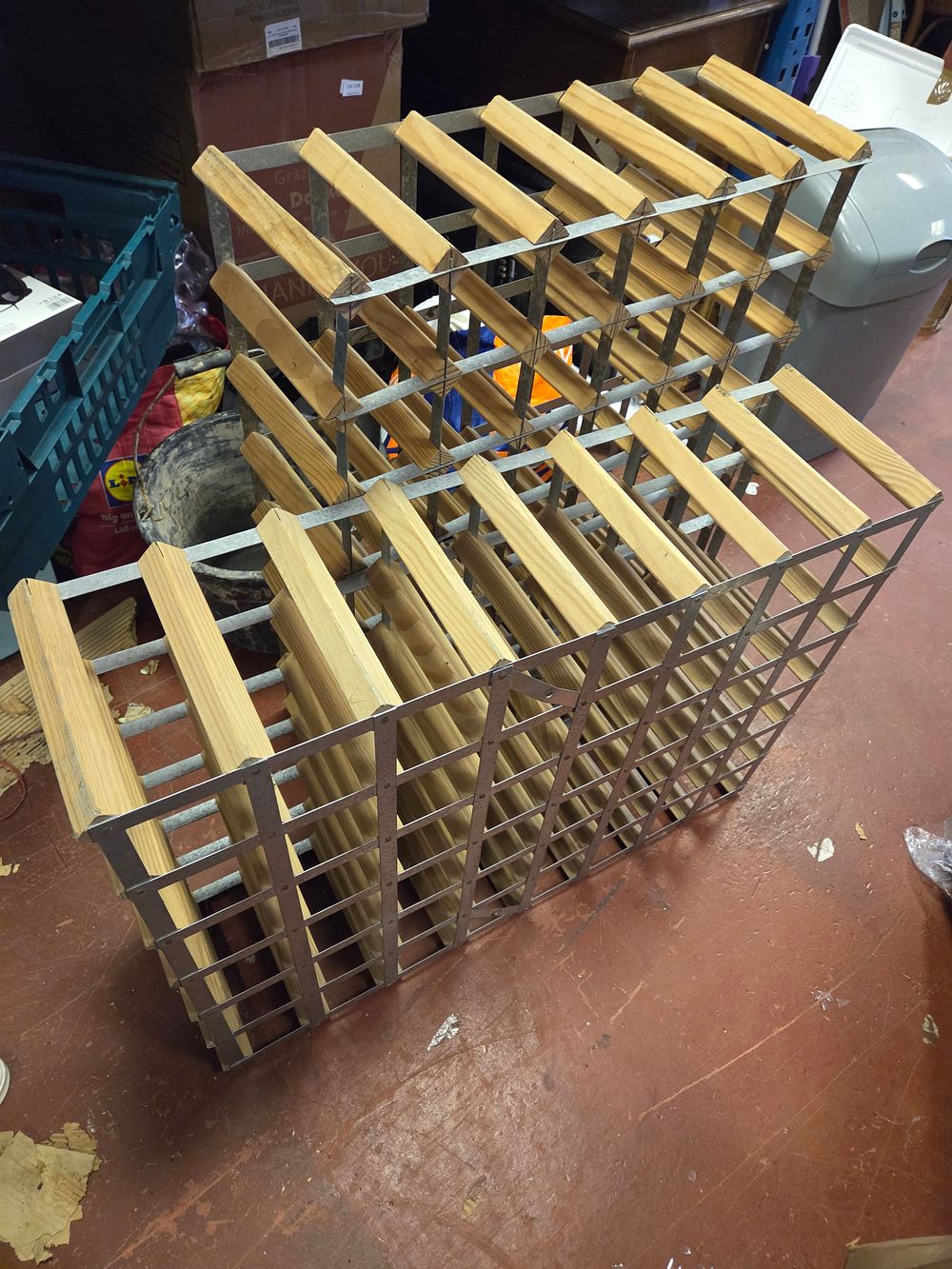 Lot 308 – A Collection of Modular Pine Wood and Galvanised Steel Wine Racks