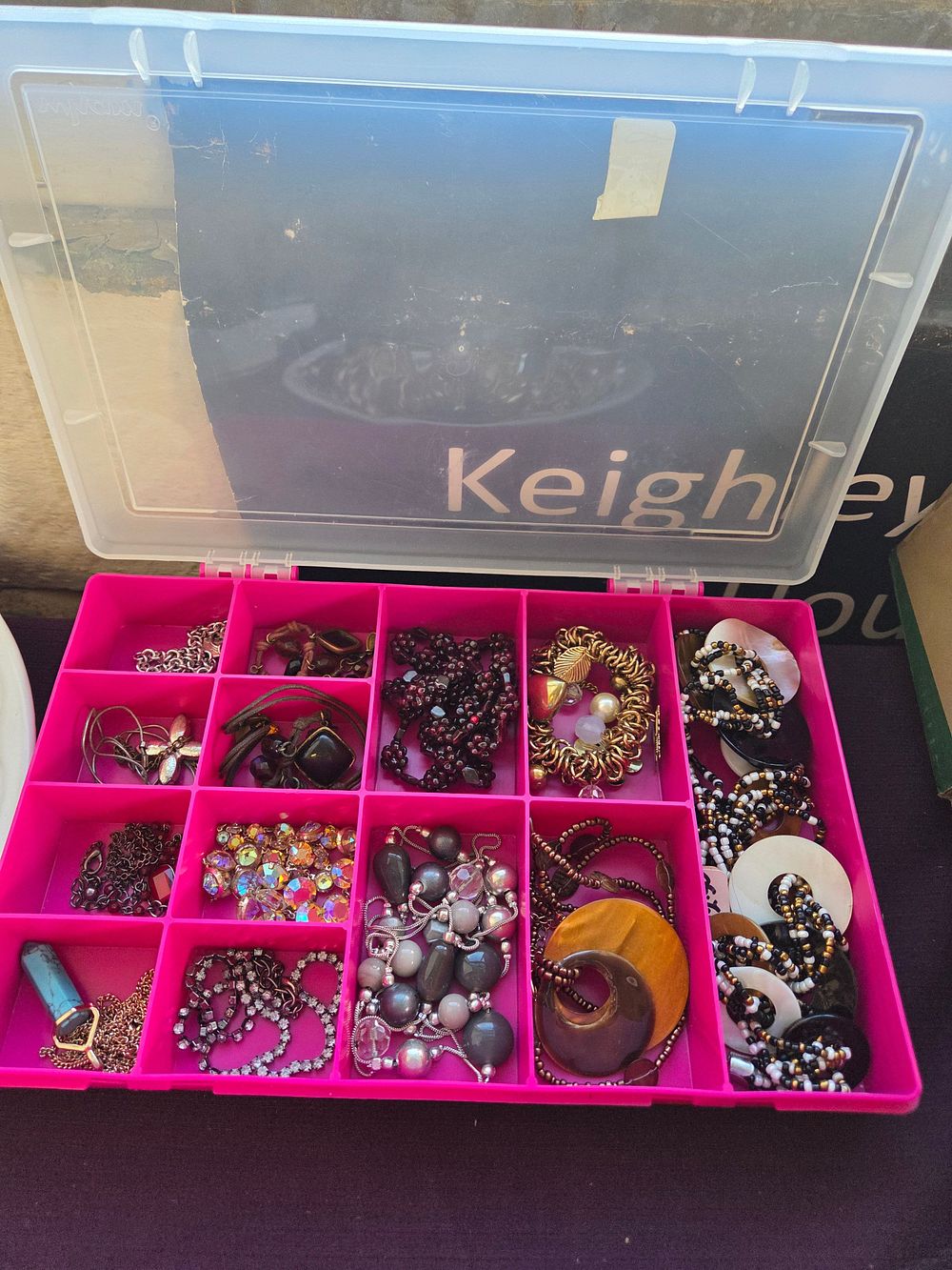 Lot 615 – An Assortment of Costume Jewellery in a Pink Plastic Case