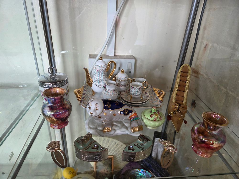 Lot 621 – A Group of Miscellaneous Cabinet Porcelain, Glass, and Metalware including a Miniature Tea Service