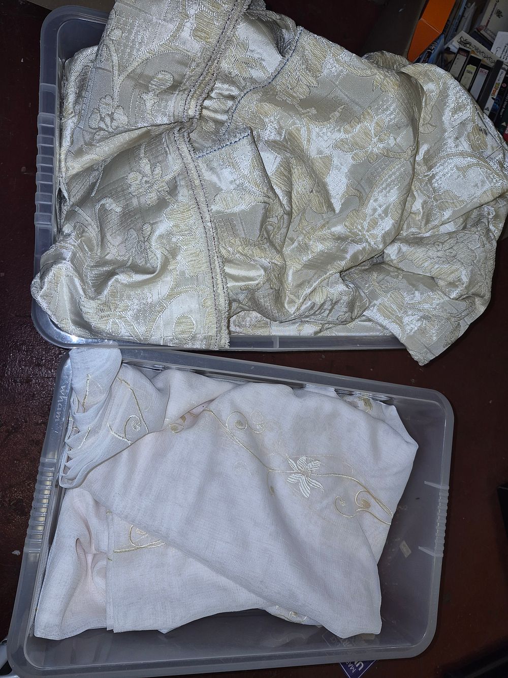 Lot 59 – Two Boxes of Assorted Window Curtains and Embroidered Table Linens