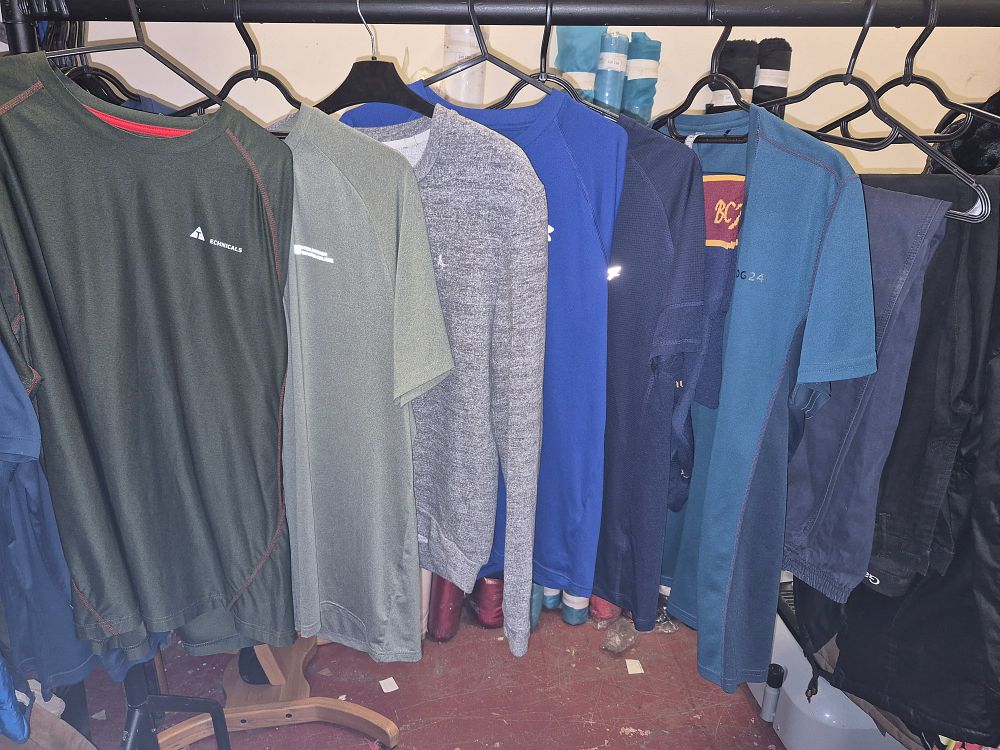 Lot 83 – An Assortment of Mens Performance Athletic and Outdoor Garments Including Mountain Warehouse, Technicals and Bradford City Football Socks. Various Sizes