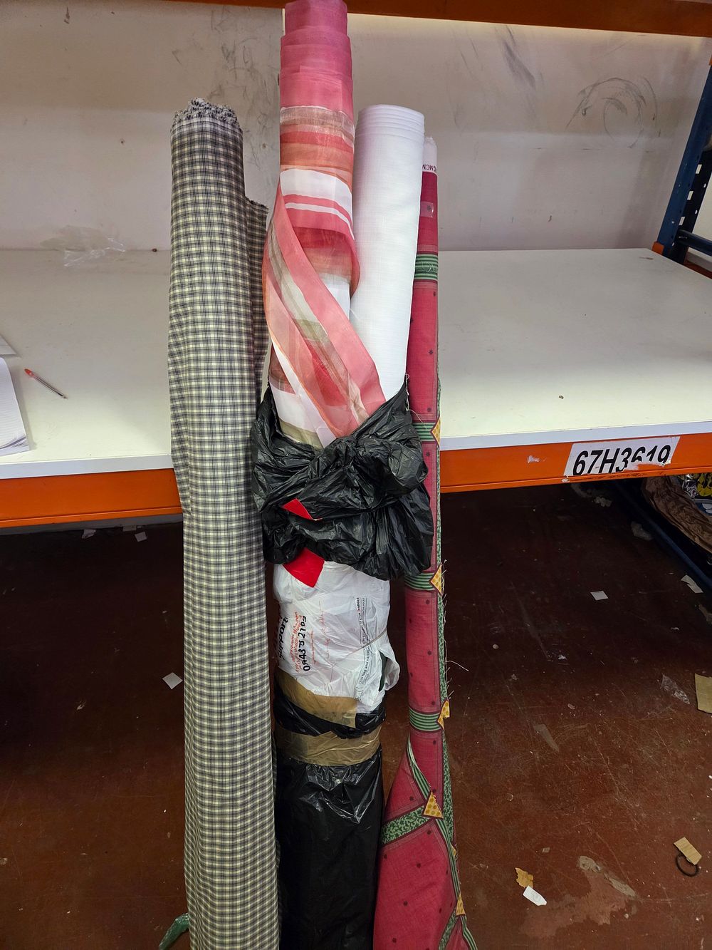 Lot 85 – An Assortment of Four Fabric Rolls in Varied Patterns and Weights