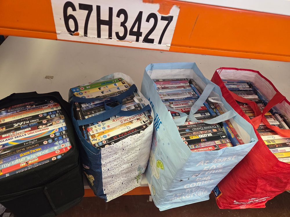 Lot 93 – An Assortment of DVDs and Media Discs Including 1917, Twilight Saga, and Family Guy
