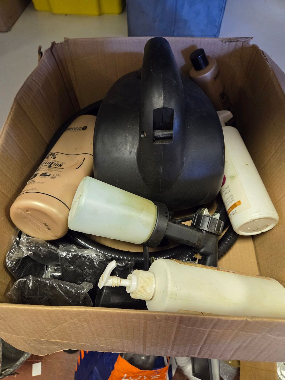 Lot 136 – An Assortment of Sienna X Spray Tanning Equipment and Solution used condition
