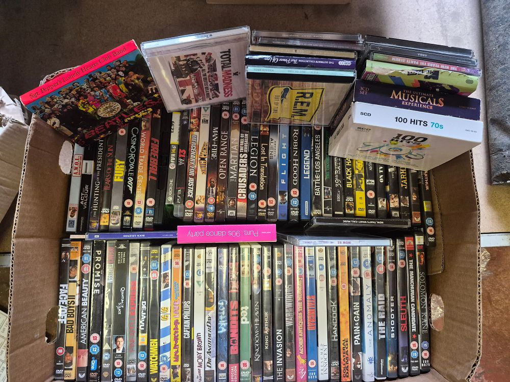 Lot 161 – A Collection of DVDs and Music CDs Including The Beatles Sgt. Peppers Lonely Hearts Club Band
