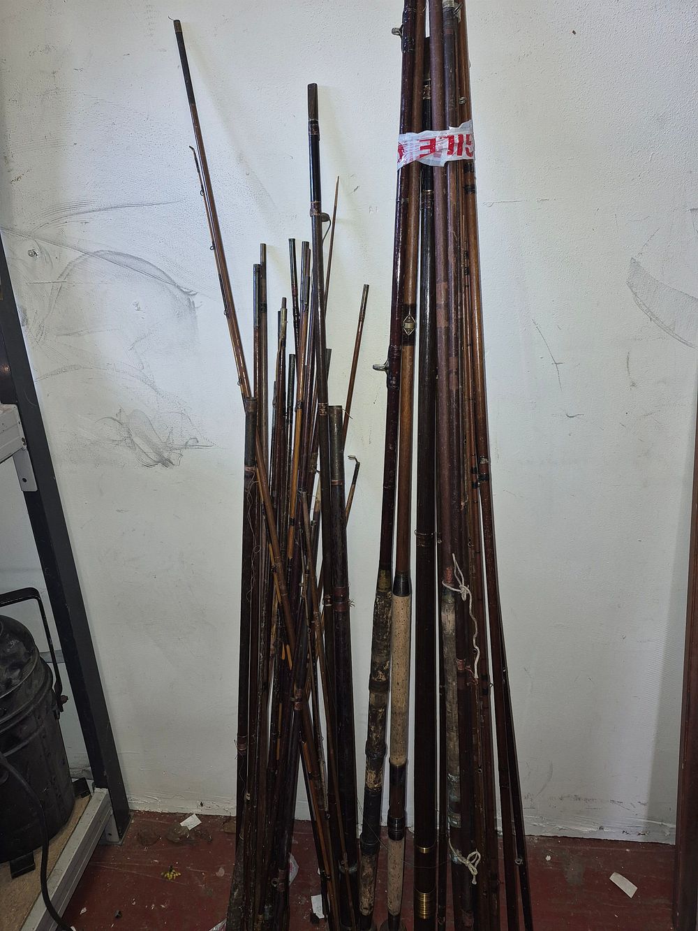 Lot 204 – A Collection of Assorted Vintage Bamboo and Wood Fishing Rods and Rod Sections